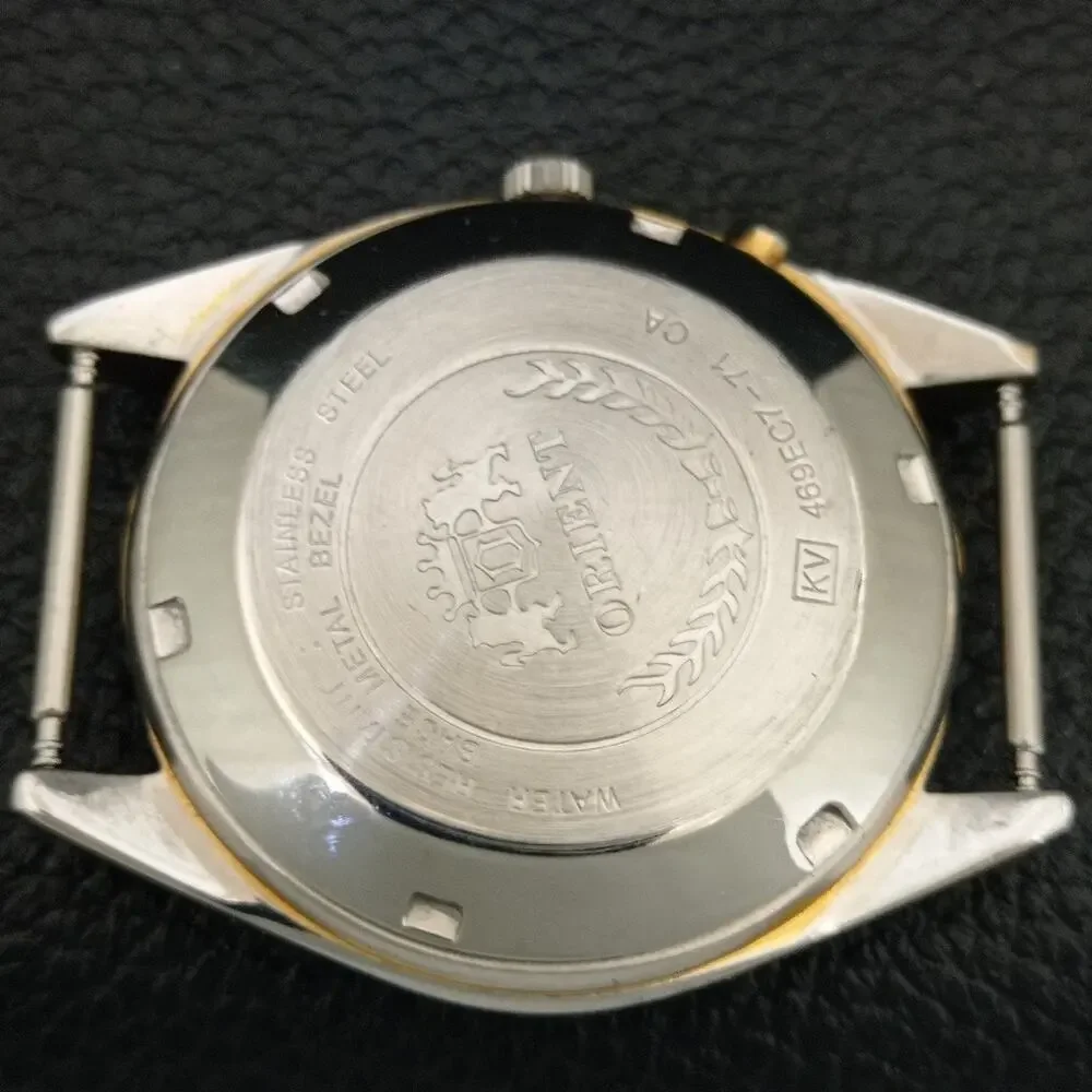 Vintage 1971 Orient Automatic Mens Silver Watch W/daydate & Gold accents